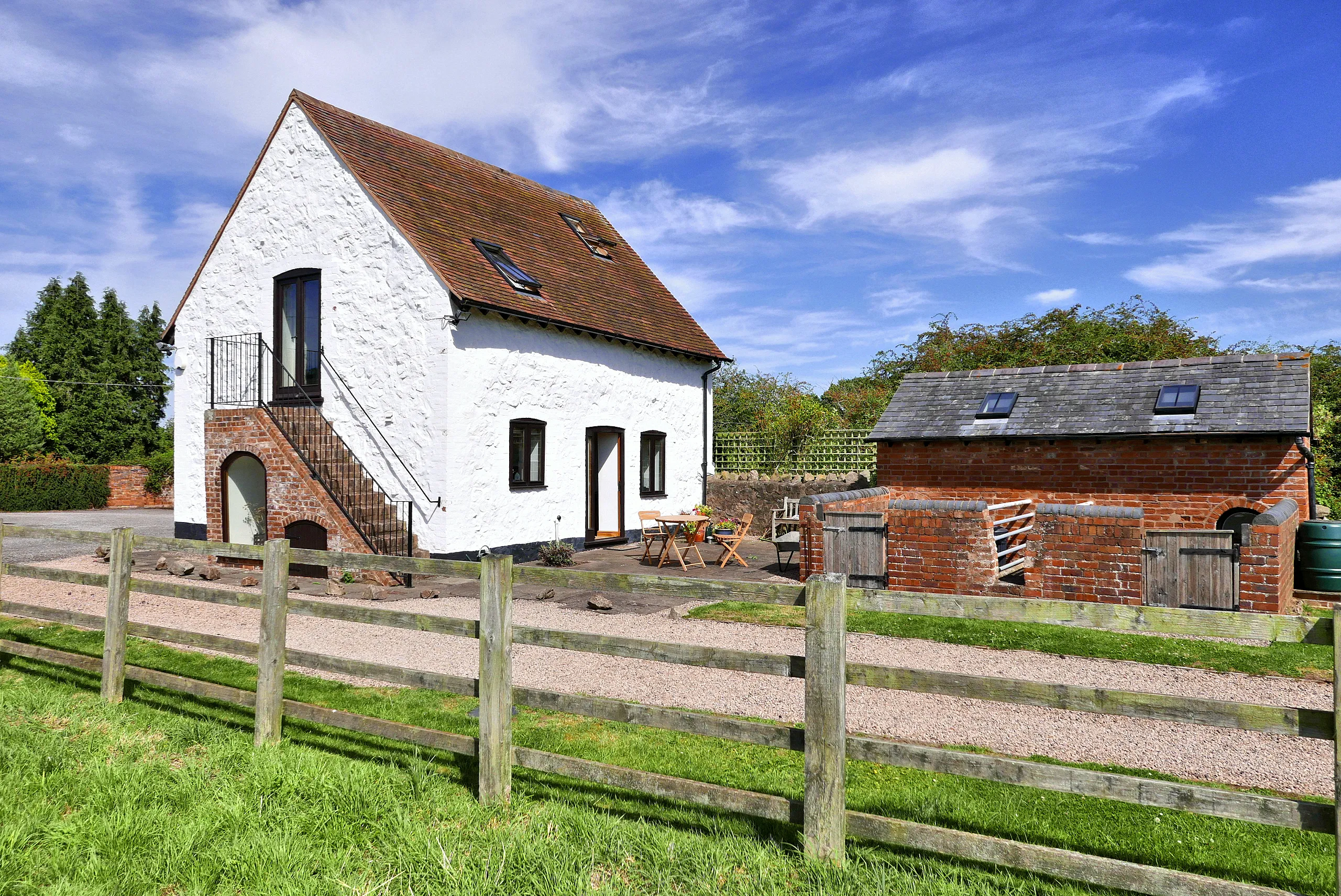 Rhydd Barn - patio and converted pigsty